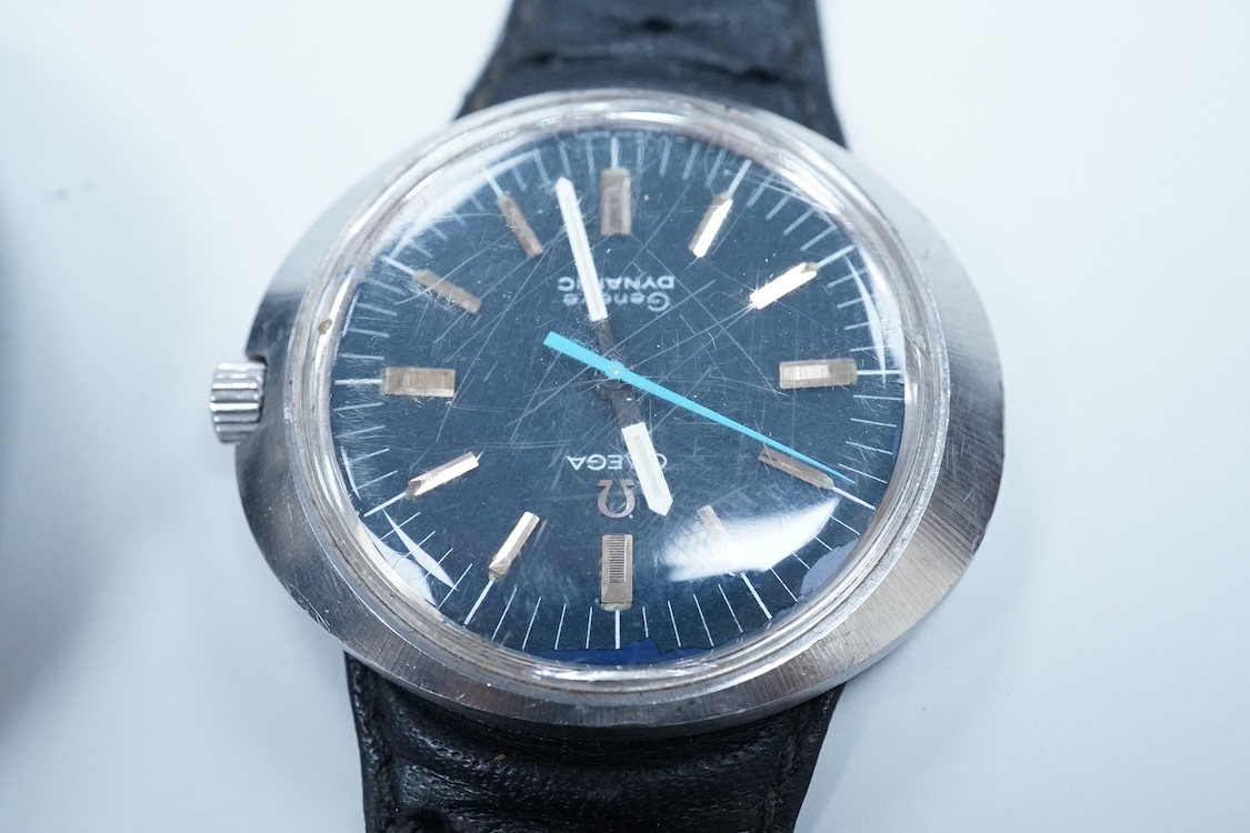 A gentleman's 1970's stainless steel Omega Dynamic manual wind wrist watch, with blue dial and baton numerals, case diameter 40mm, on a leather strap wit Omega buckle, together with a gentleman's Seiko Kinetic and a simi
